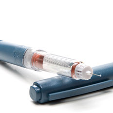 An open insulin pen.